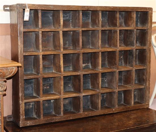 A teak pigeon hole chest W.100cm